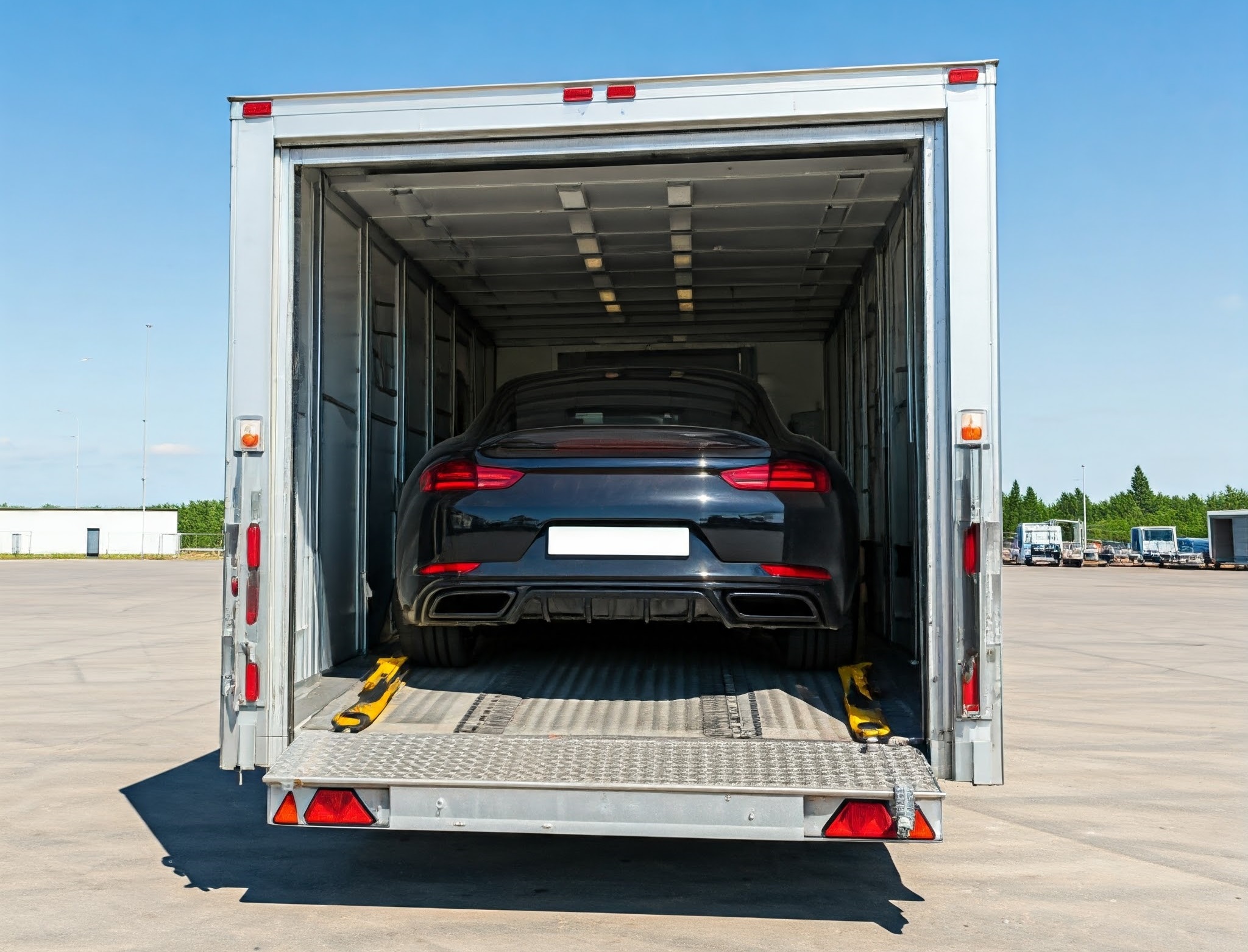 A car transported in an enclosed trailer